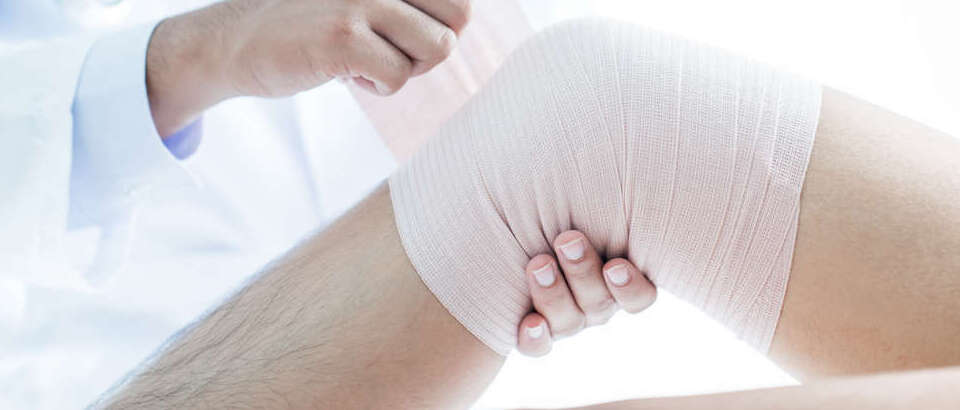 Patient with knee problem at consulting room