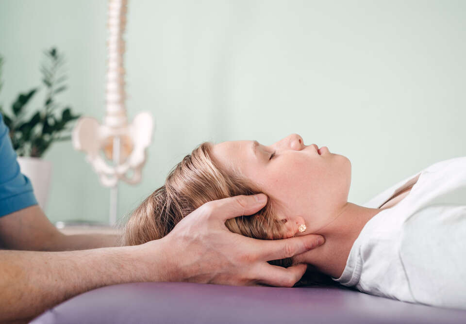 girl receiving treatment for migraine